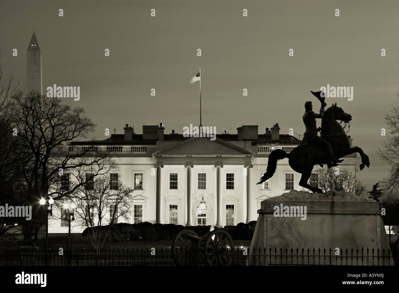 The White House and the equestrian statue of Andrew Jackson in Lafayette Square, Washington DC US at dusk. Black and white. Stock Photo