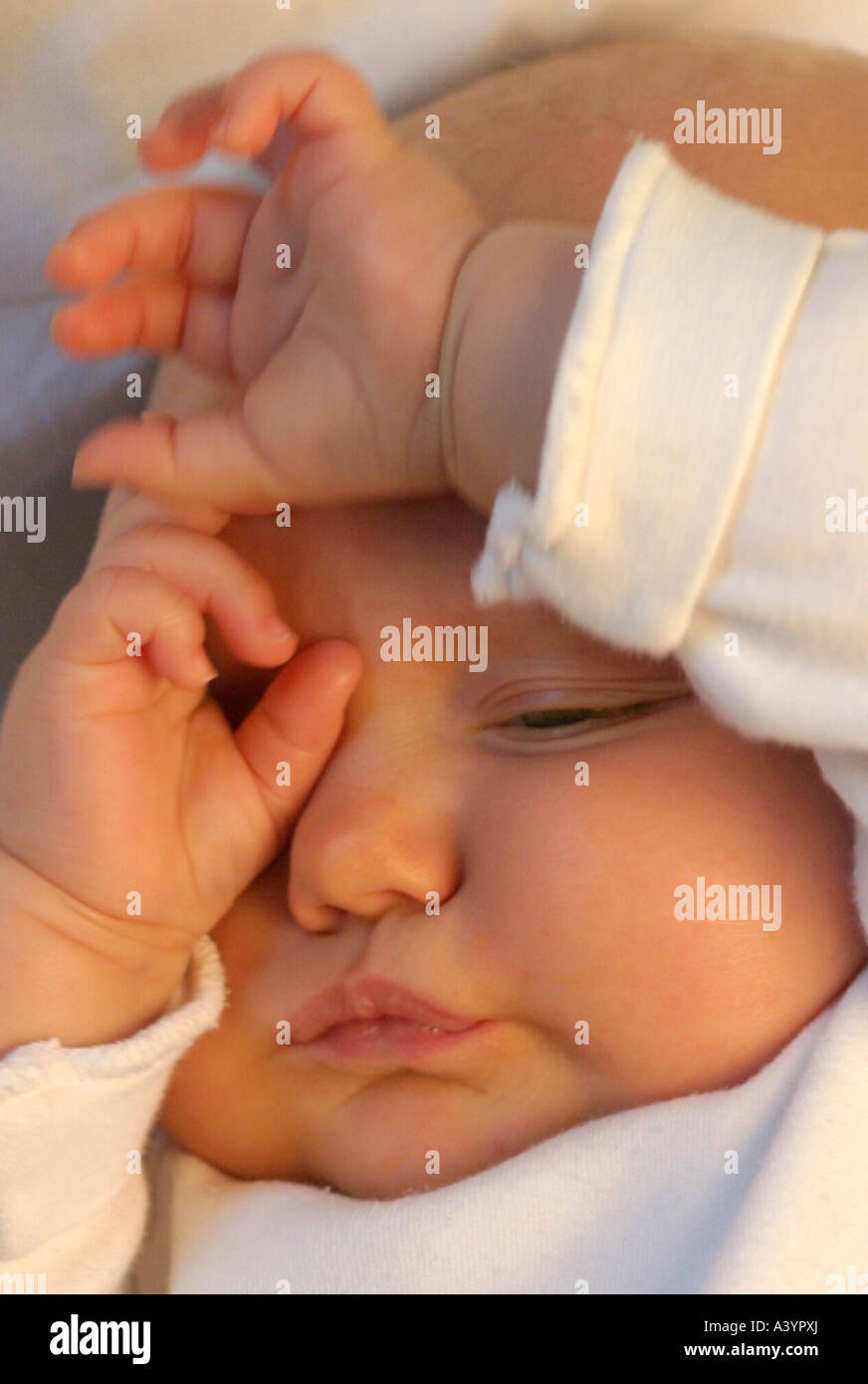 people, human beings, humans (Homo sapiens sapiens), baby, rubbing tirely his eyes Stock Photo