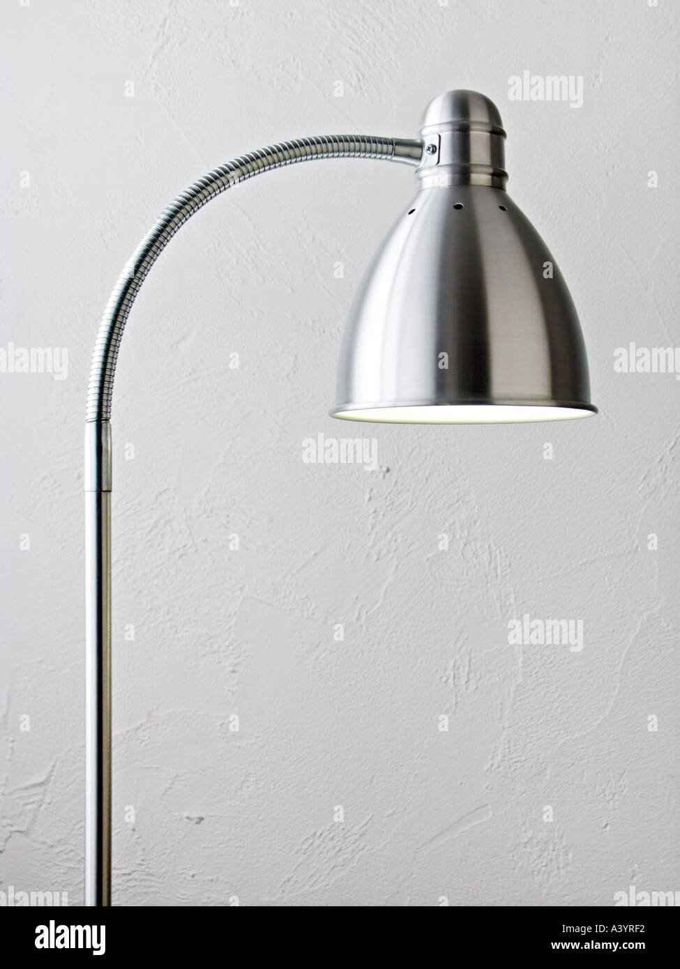 A silver aluminium reading lamp Stock Photo
