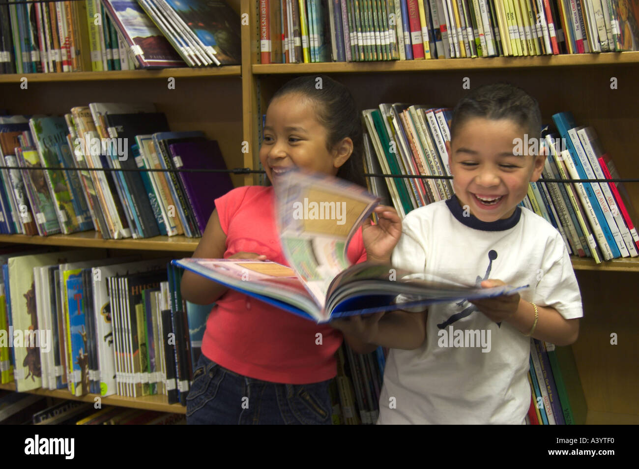 Children hugging library hi-res stock photography and images - Alamy