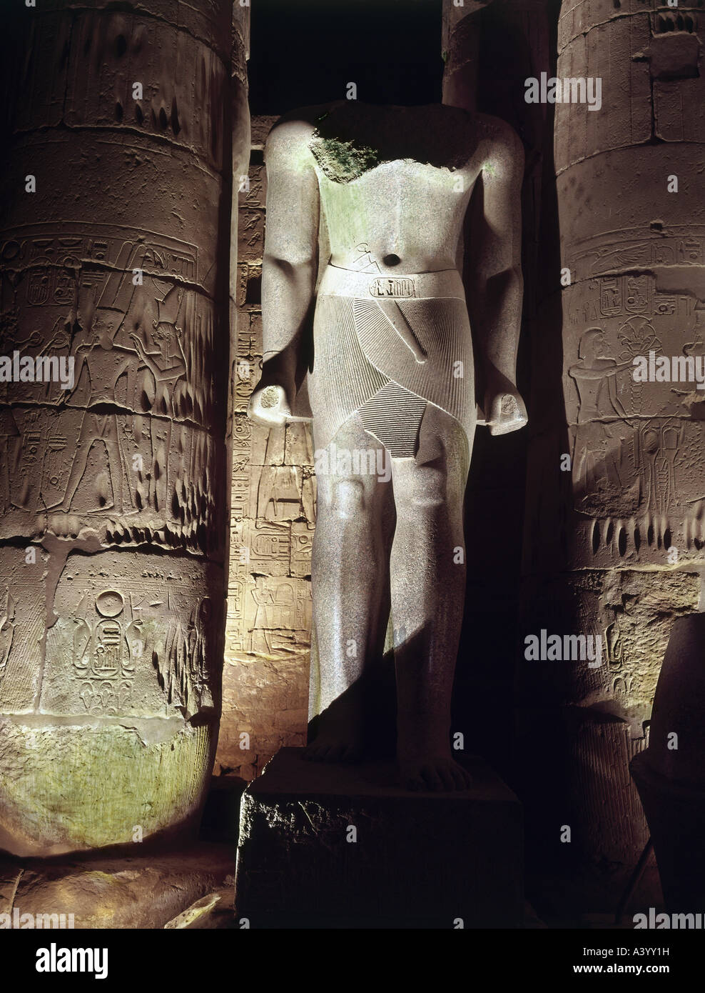 travel /geography, Egypt, Luxor, buildings, temple, Theban divine family Amun, Mut, Chons, exterior view, night, temple of Ramesses II, southern part, statue of pharaoh Amenhotep III, architect Amenhotep son of Hapu, 1402 - 1364 B.C., extensions under Ramesses II, 1303 - 1236 B.C., historic, historical, Africa, architecture, temples, ancient world, New Kingdom, 18th / 19th dynasty, 15th - 13th century B.C., column, columns, statues, sculpture, sculptures, ancient world, Stock Photo