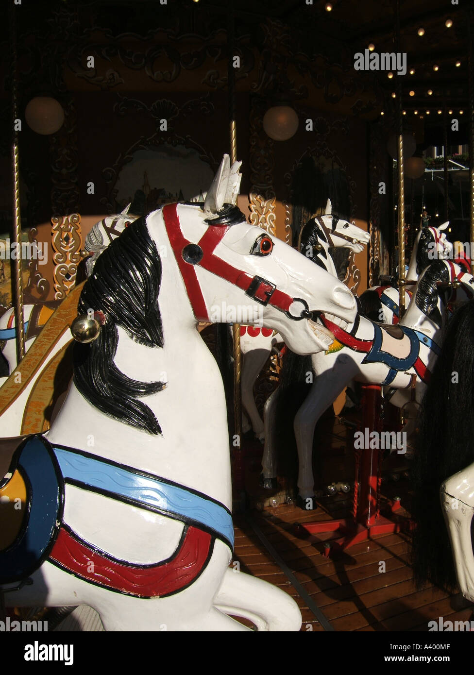 carousel horse fair ground ride Stock Photo - Alamy