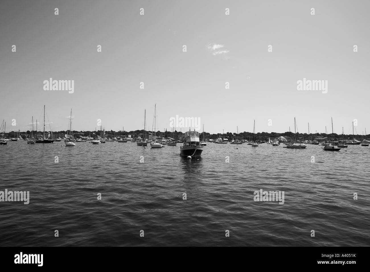 Boats moored in a harbor Stock Photo - Alamy