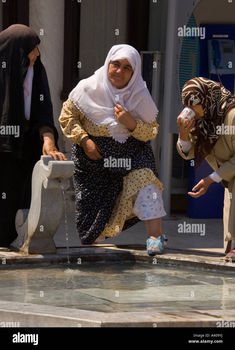 Drinking Holy water Mevlana Konya Turkey Stock Photo