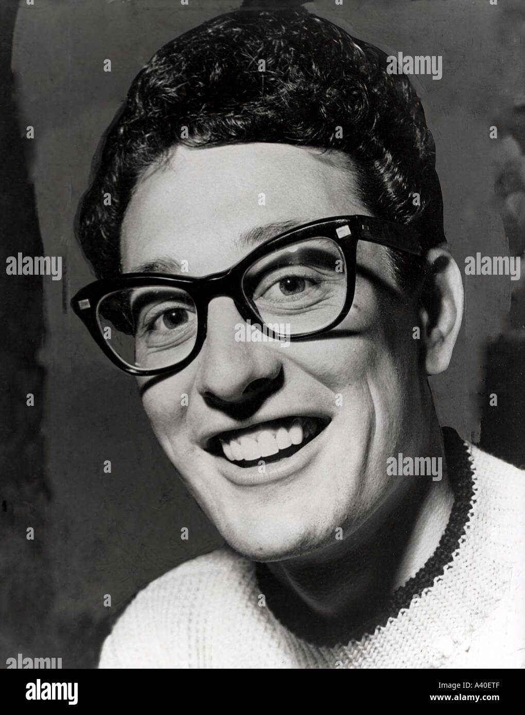 BUDDY HOLLY (1936-1959) Promotional photo of US pop musician about 1957 Stock Photo