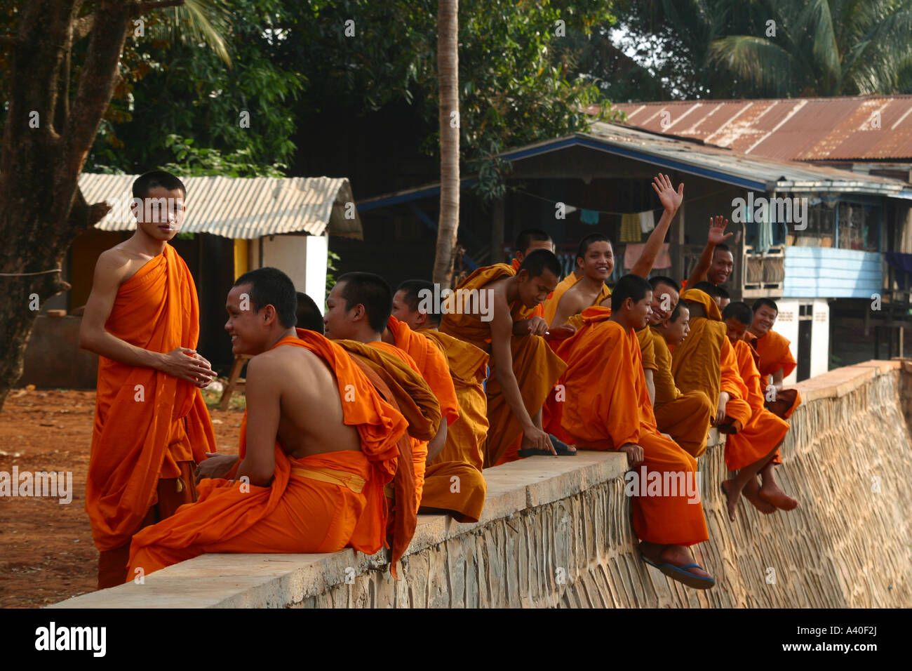 the monks of monastery and temple Wat Luang in Pakxe Stock Photo