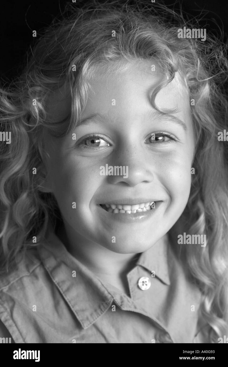 Black haired smiling kid hi-res stock photography and images - Alamy