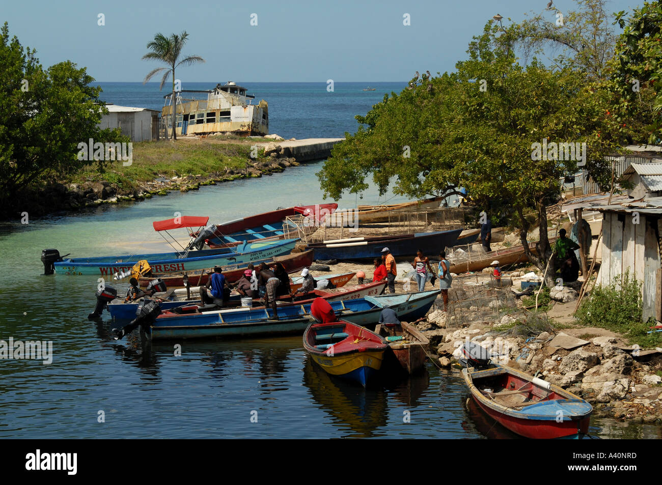 Fishing boats on the Negril river Negril Jamaica Stock Photo Alamy