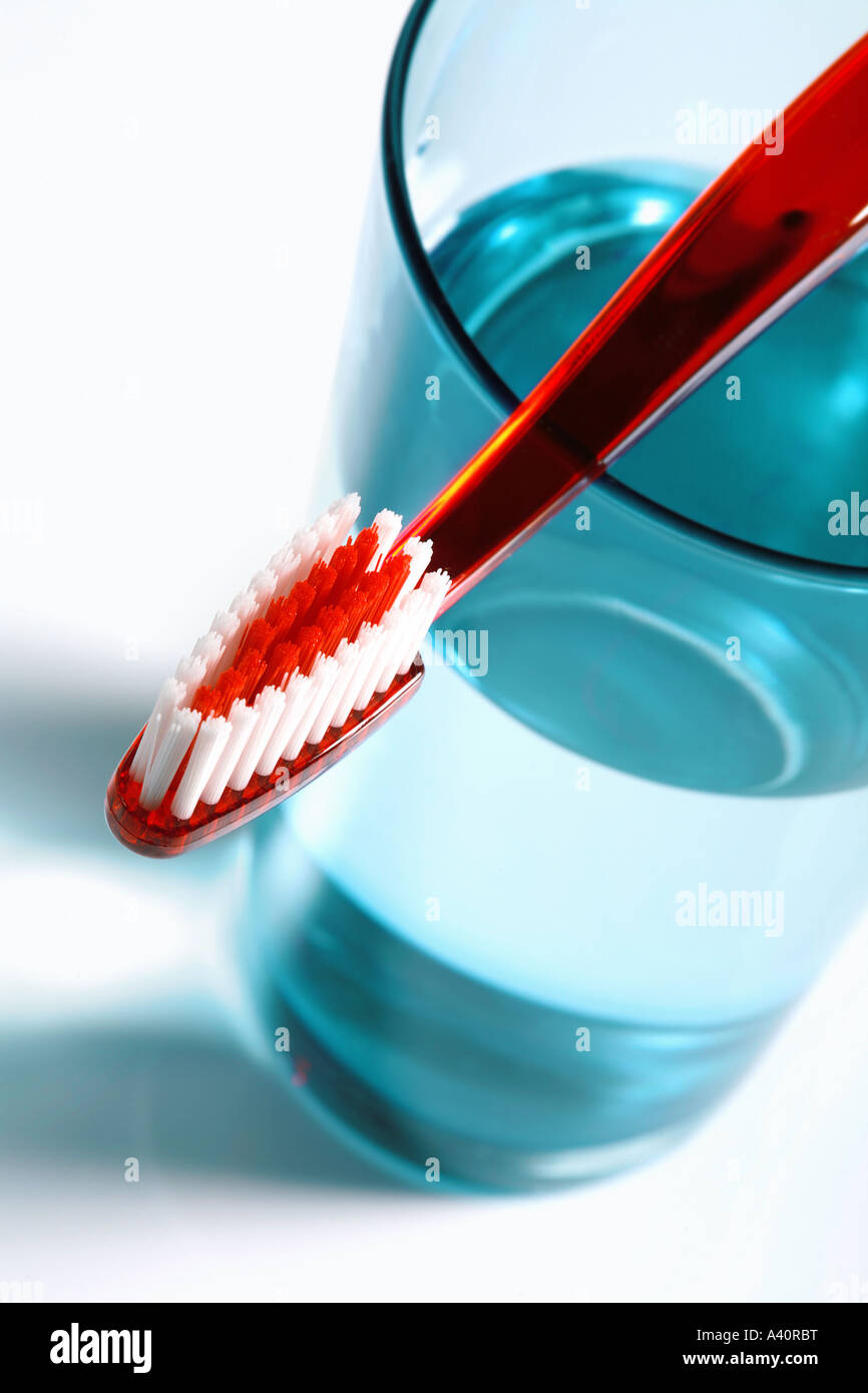 toothbrush with a glass Zahnbuerste mit Glas Stock Photo
