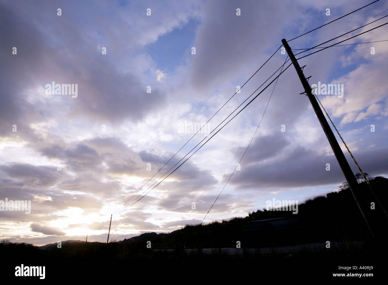 CLOUDY SKY WITH POWER LINES Stock Photo - Alamy
