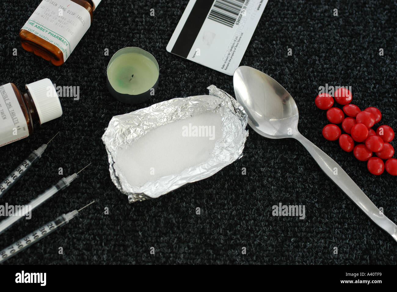 Class A drugs, Cocaine and a drug users syringes and equipment Stock