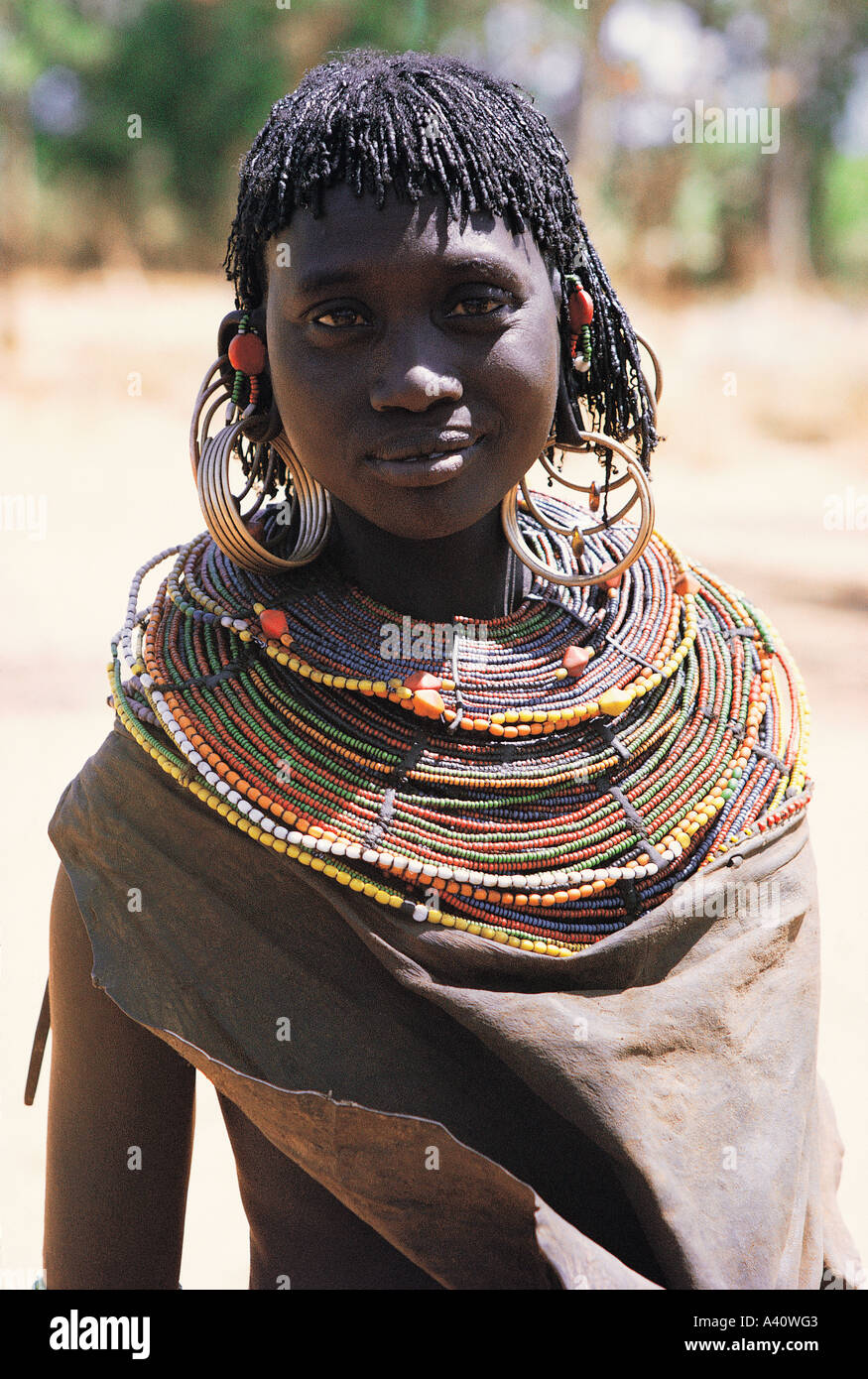 Pokot woman with traditional large brass ear rings Near Sigor northern ...