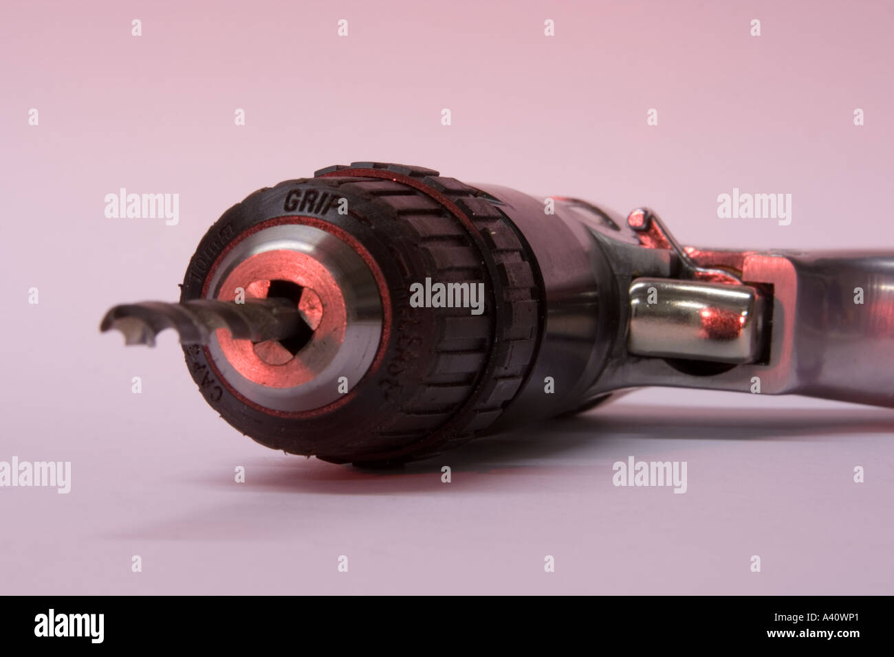 Chuck and bit of compressed air powered drill Stock Photo Alamy
