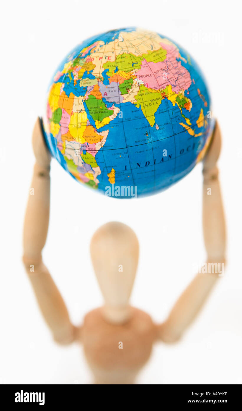 Mannequin with globe in air Stock Photo