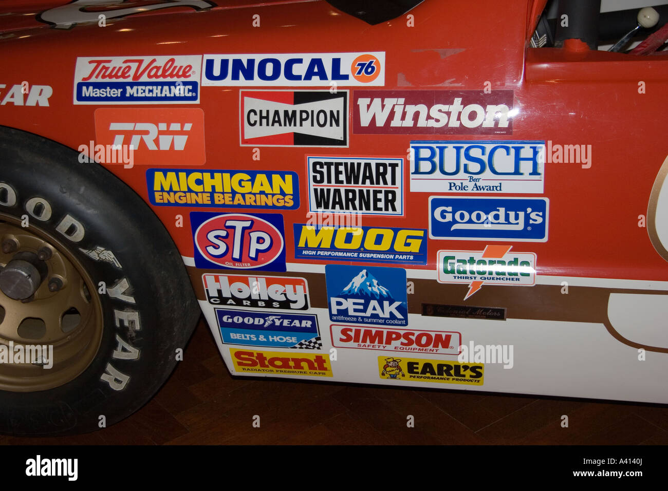 Advertising logo's on stock car Stock Photo - Alamy