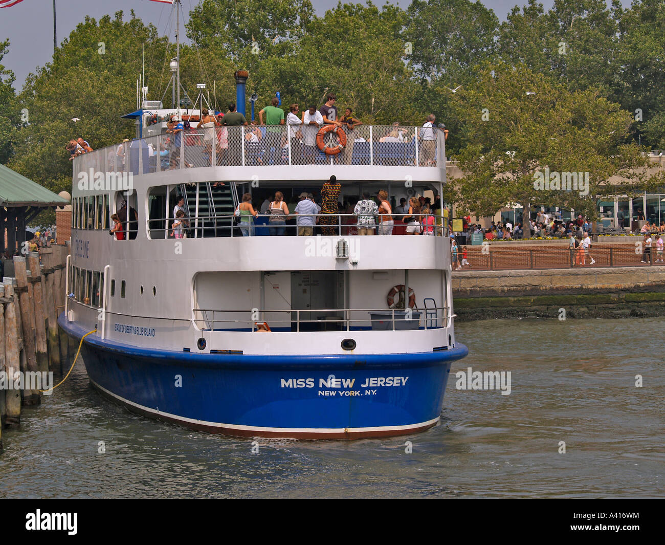 Ferry from New Jersey arrives at Ellis Island New York City United States  of America Stock Photo - Alamy