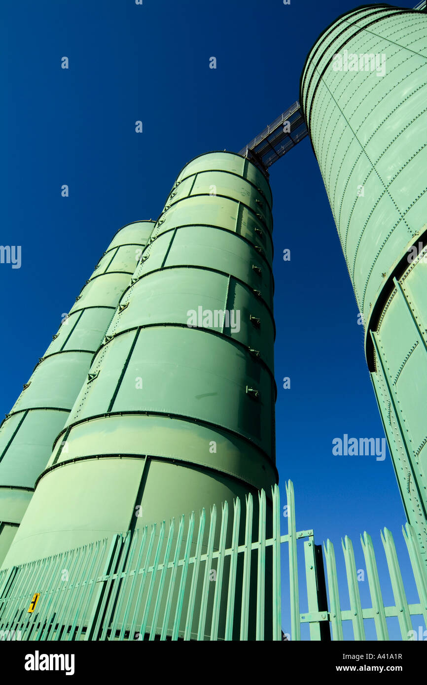 Tall green grain silos at the bakery at Slaford Quays in Stretford