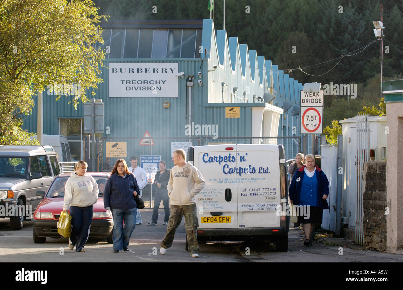 Workers leave the Burberry clothing factory in Treorchy Rhondda Valley  South Wales UK Stock Photo - Alamy