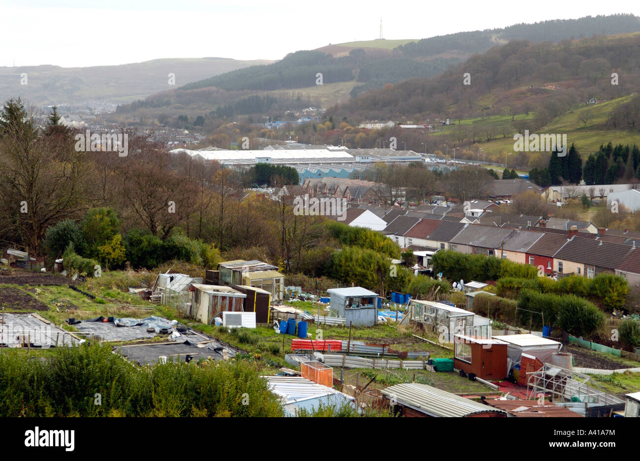 Burberry clothing factory centre frame in Treorchy Rhondda Valley Wales UK  viewed over garden & houses Stock Photo - Alamy