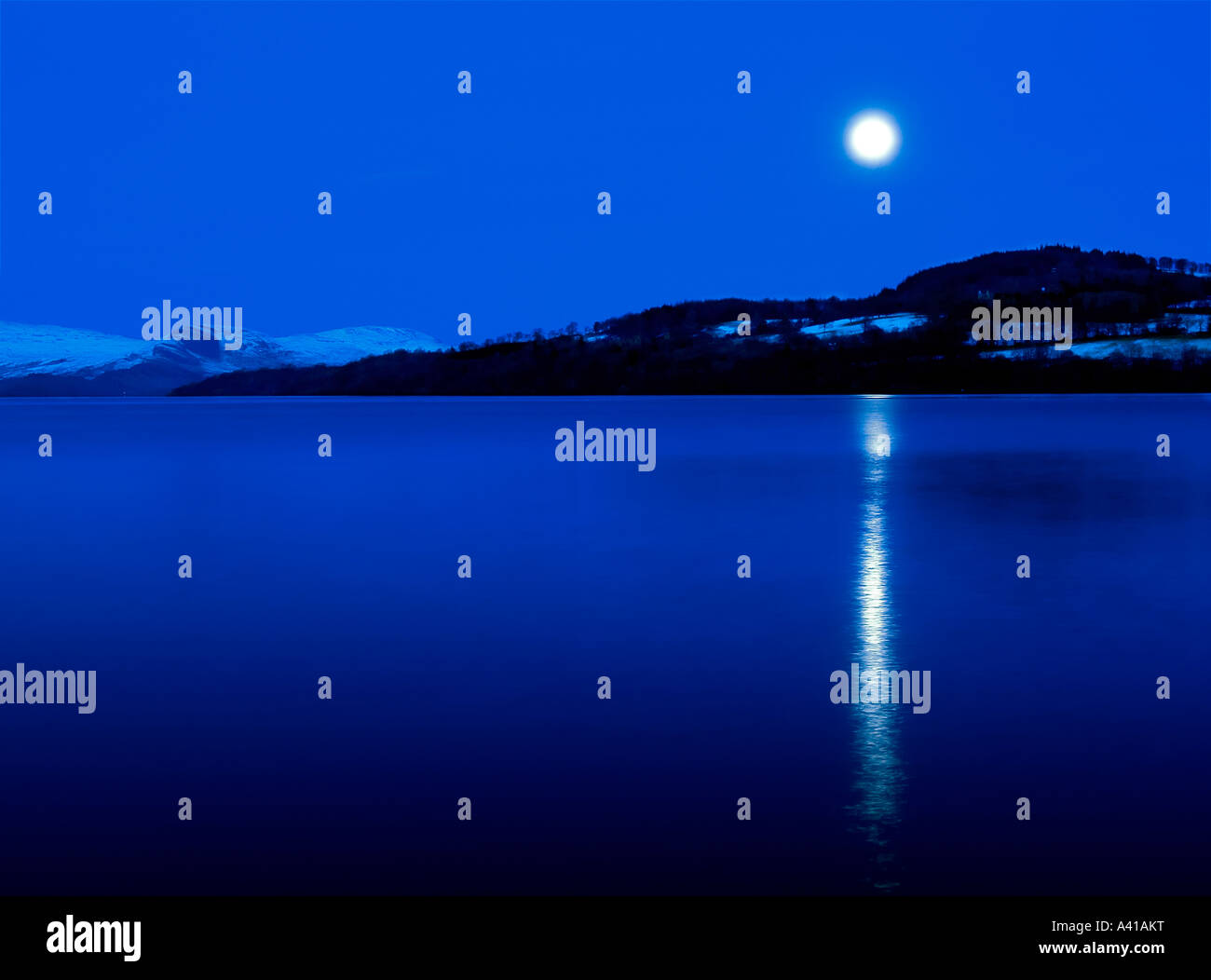 The moonlight shines over Loch Lomond Stock Photo