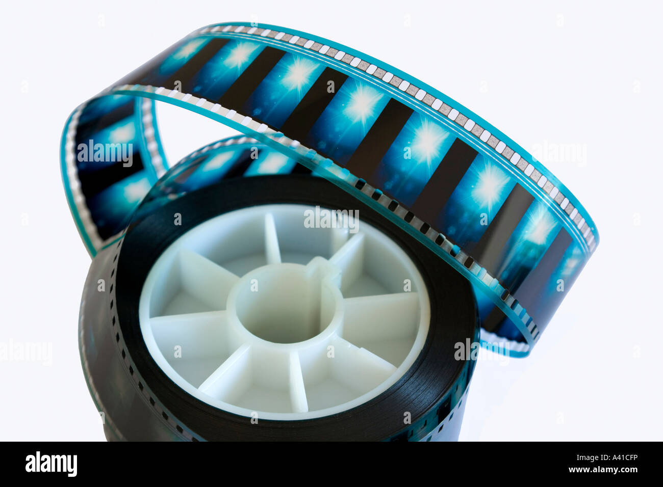 Small roll of 35mm motion picture positive print film with Dolby Digital and cyan dye analog optical soundtrack Stock Photo