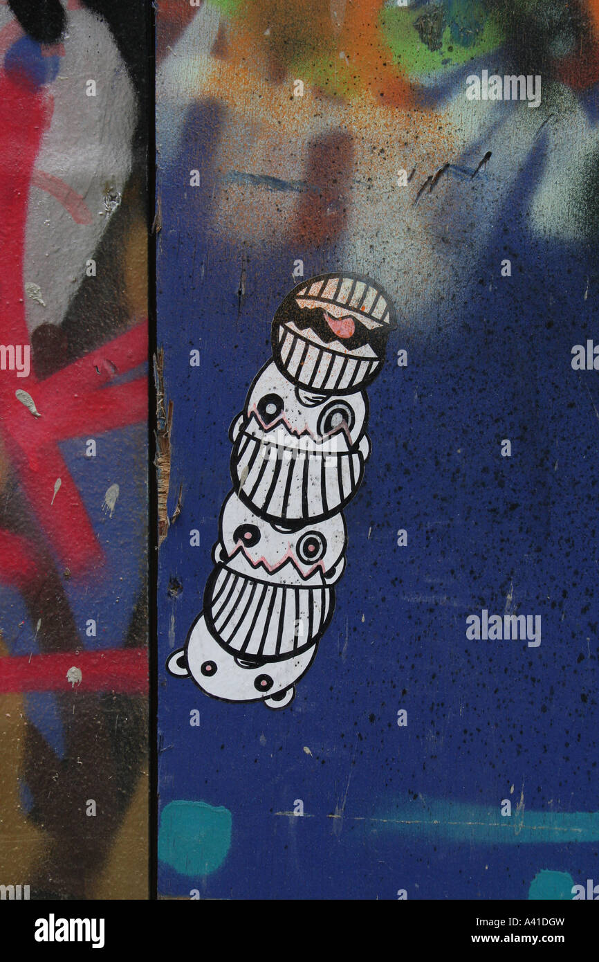 sticker design on hoarding Stock Photo - Alamy