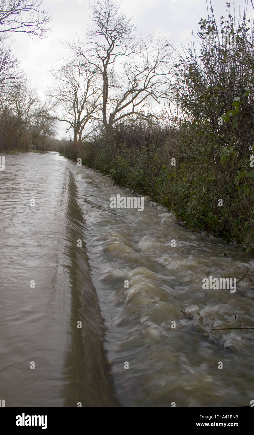 Country road flooded after heavy rain Stock Photo - Alamy