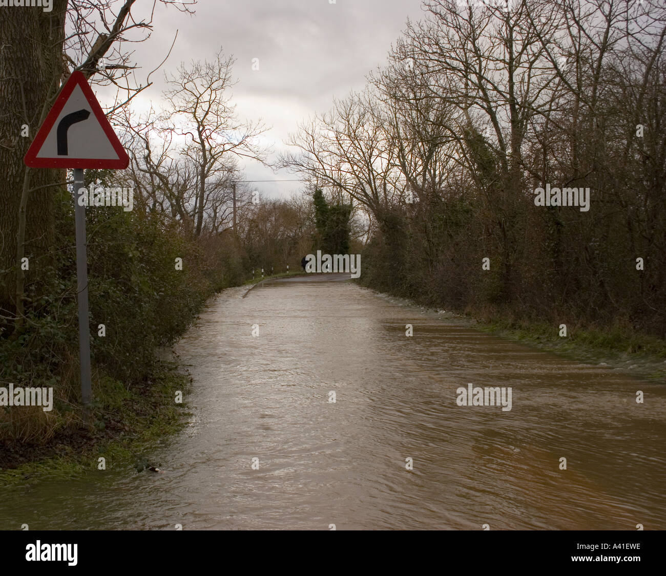 Country road flooded after heavy rain Stock Photo - Alamy