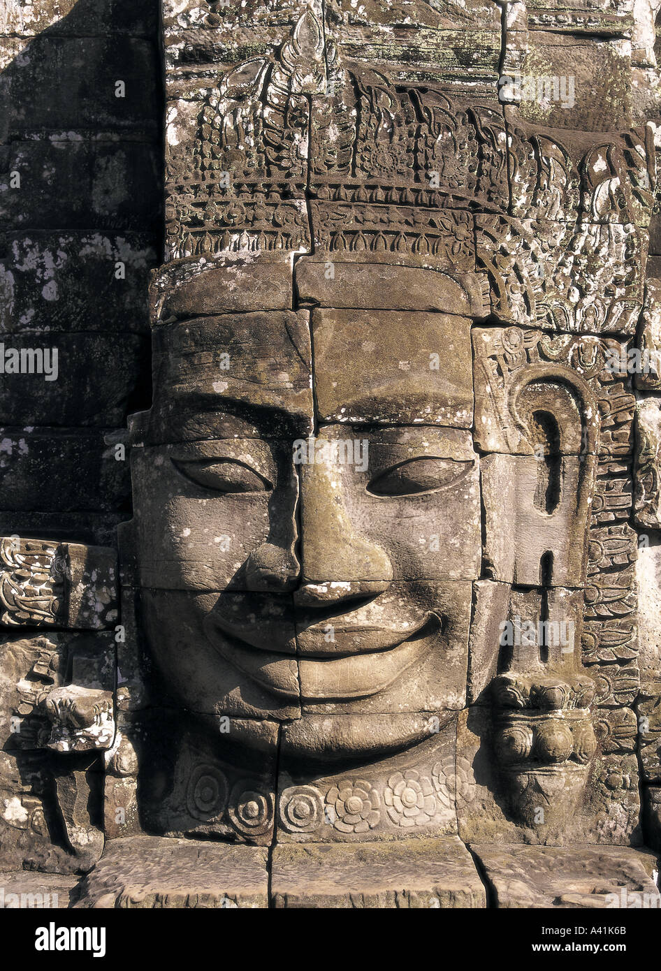 Smiling four faced Buddha statue at Bayon Temple at Angkor Wat Cambodia Stock Photo