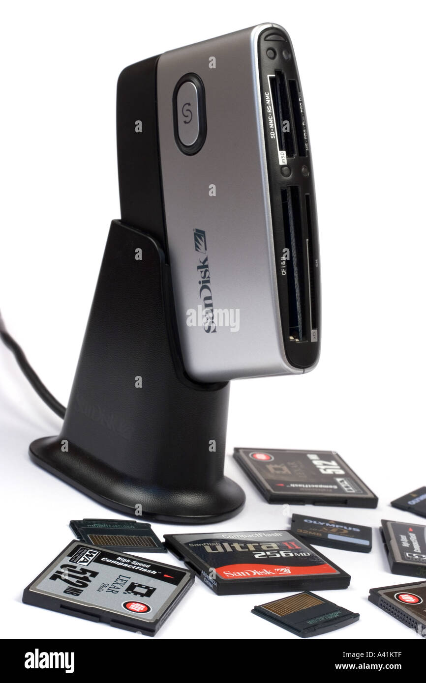 Sandisk Memory card reader with xD and Compact Flash cards scattered ...
