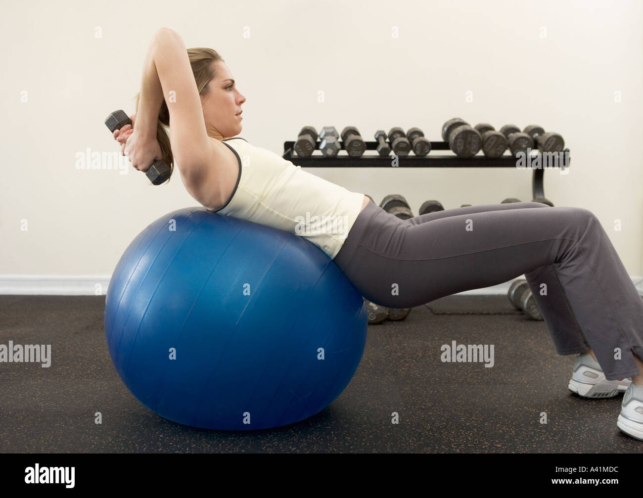 Woman using exercise ball Stock Photo Alamy