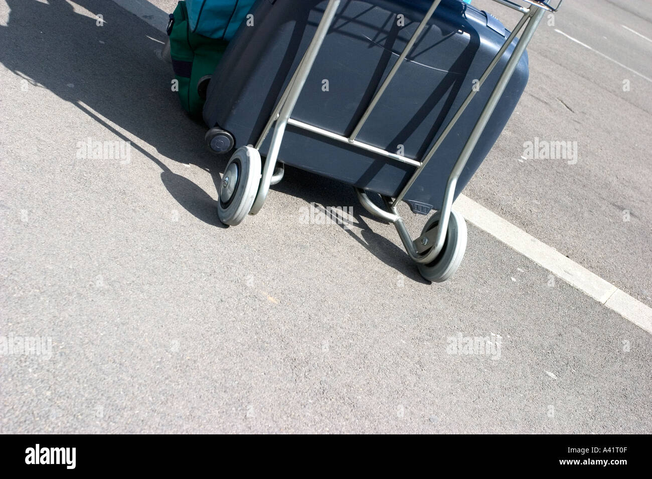 detail of luggage wheels in outdoor airport Stock Photo