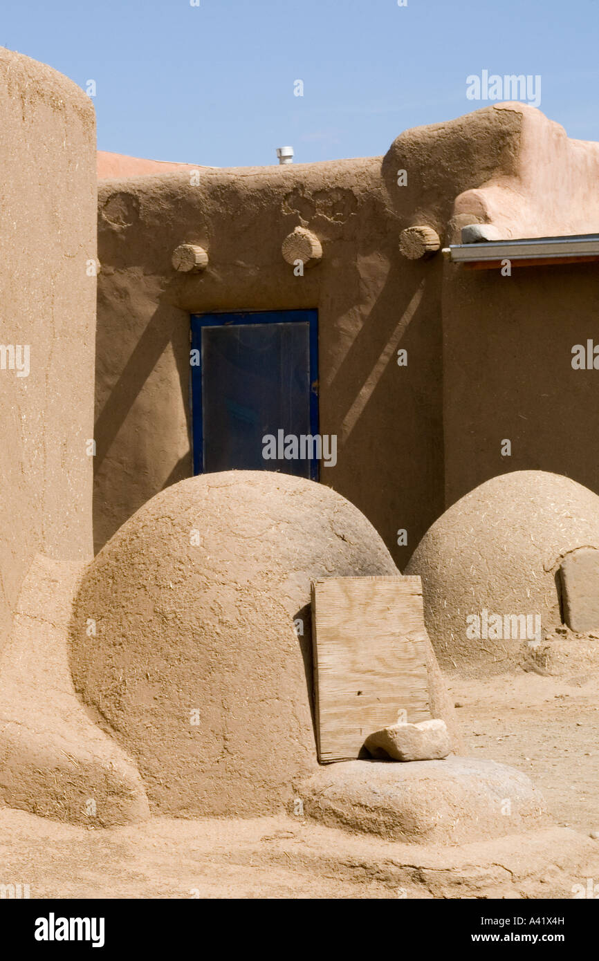 The adobe building of the North Pueblo dating from 1450 Taos Pueblo New Mexico Hornos bread baking ovens Stock Photo