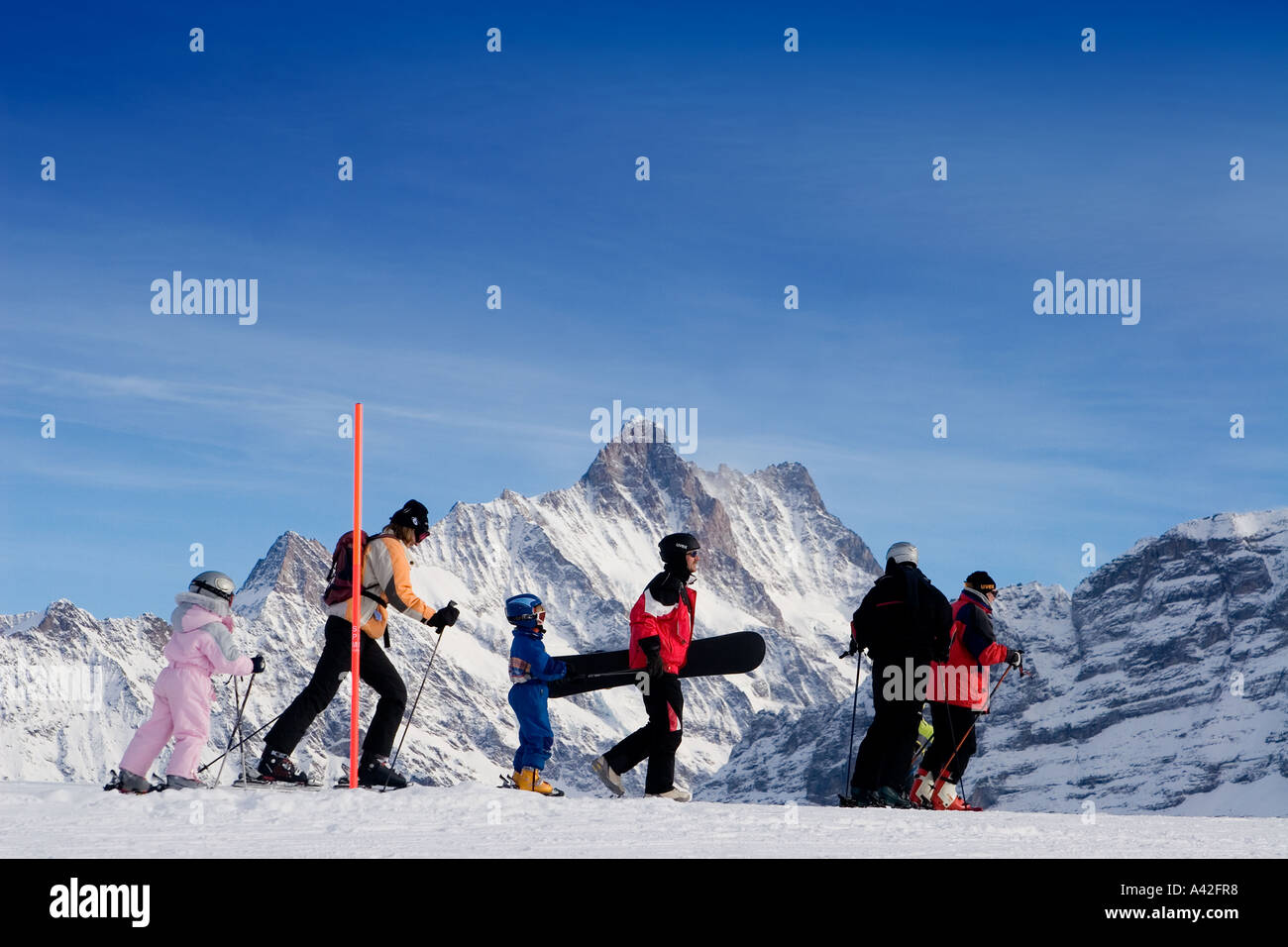 Switzerland bernese alps Mount Maennlichen skiing and snowboarding piste beautifil panoramic view to bernese alps Mount Eiger Mo Stock Photo