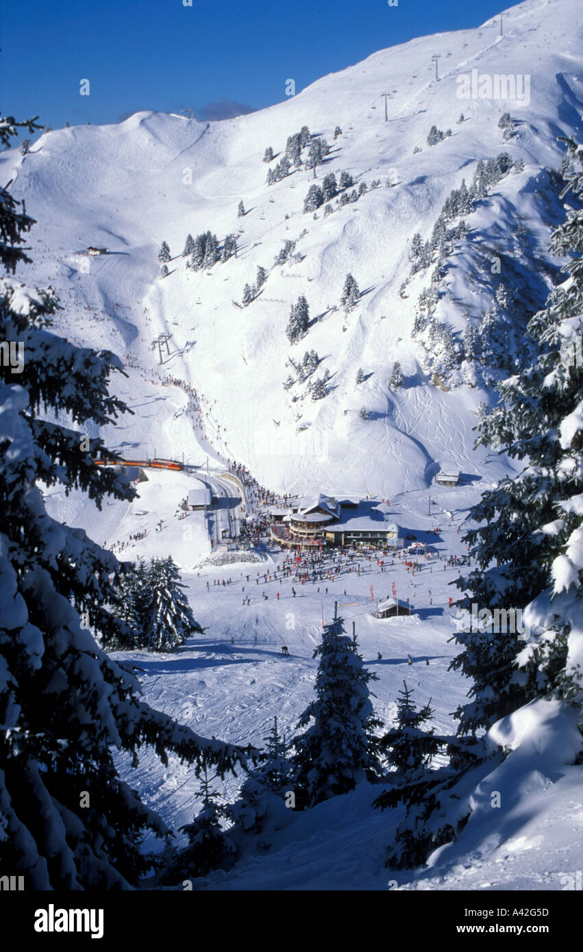 GV of Bretaye with red train and ski lifts at the ski resort of Villars Switzerland Stock Photo