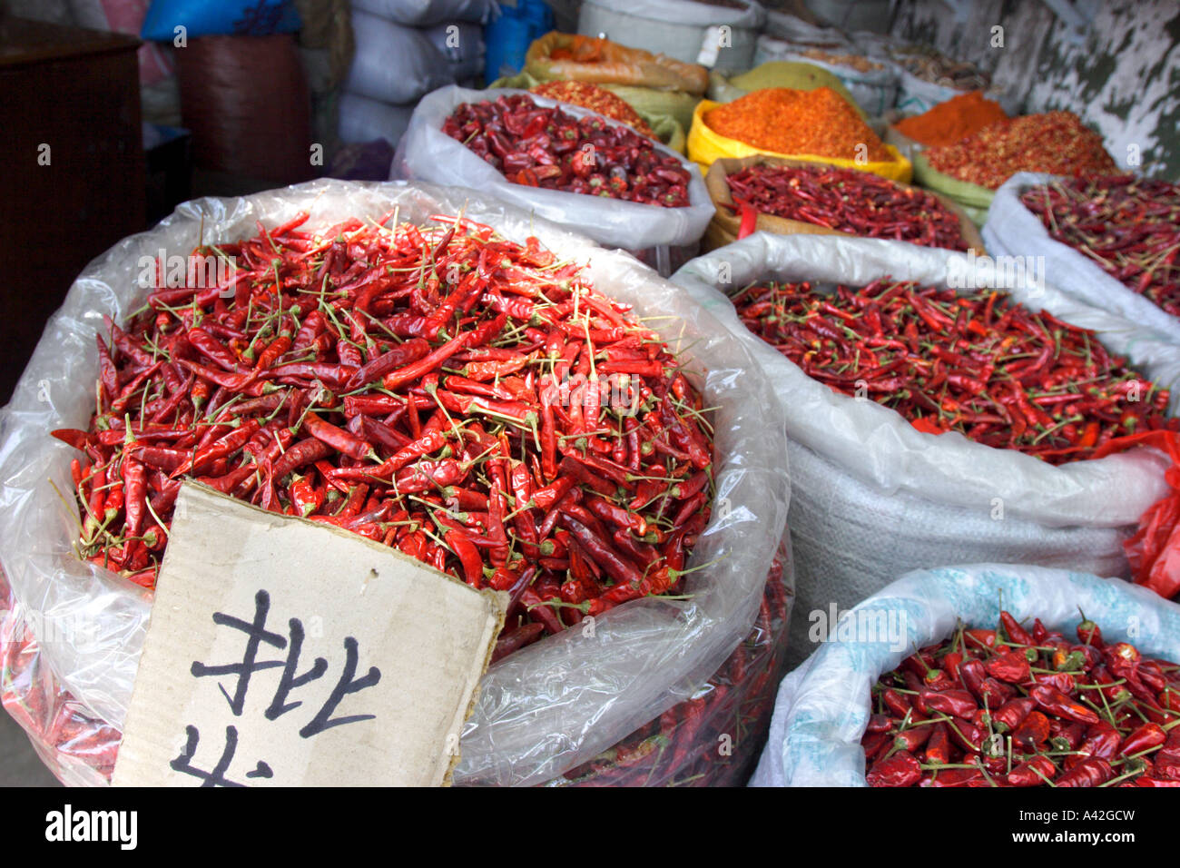 Red Chilli Peppers on sale in Wuhan, China Stock Photo
