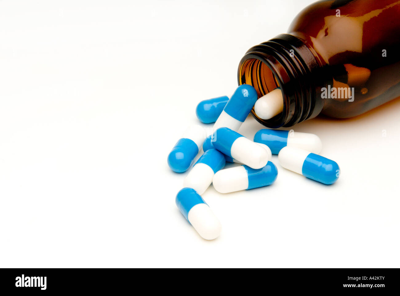 Medicine bottle with capsule pills, cut out. Stock Photo
