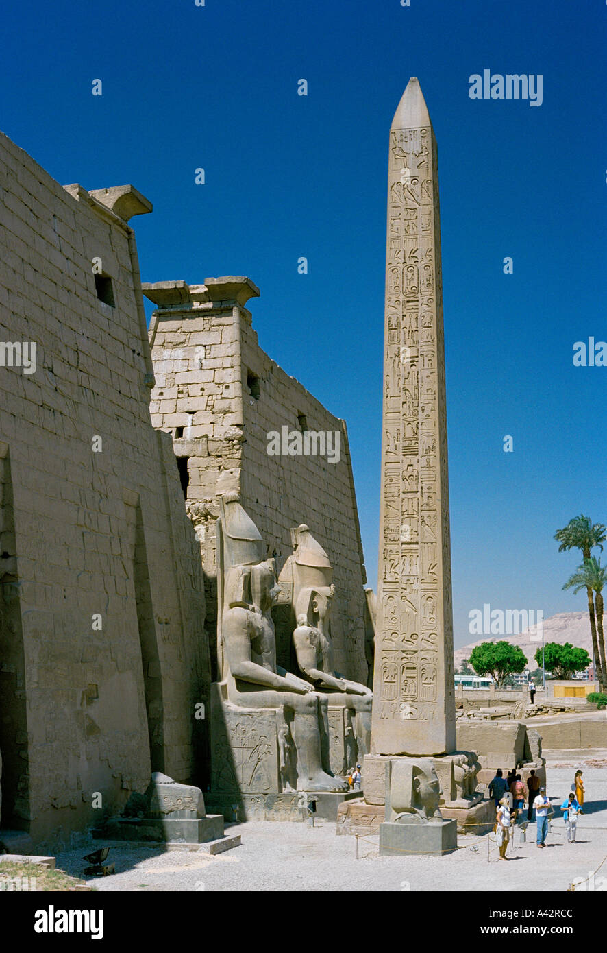 The magnificent Temple of Luxor with colossal statues of Ramses ll and ...