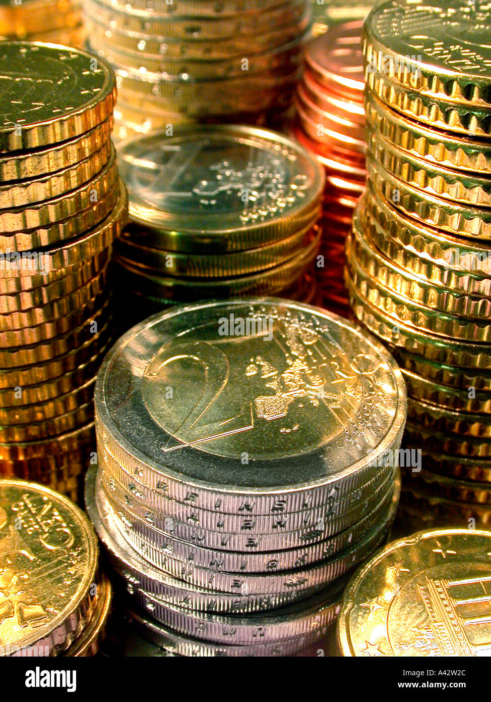 many euro coins stacked viele Euromünzen gestapelt Stock Photo