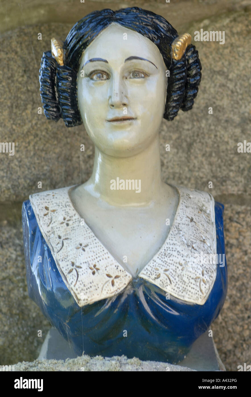 Ships figurehead in the form of a young woman Tresco Abbey Gardens Stock Photo