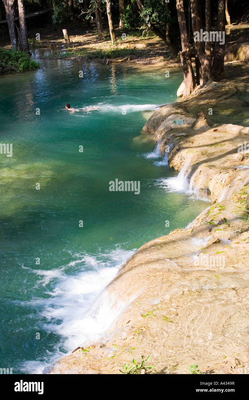 Tourist Swimming on a Daytrip to Tat Sae Falls Luang Prabang Laos Stock Photo