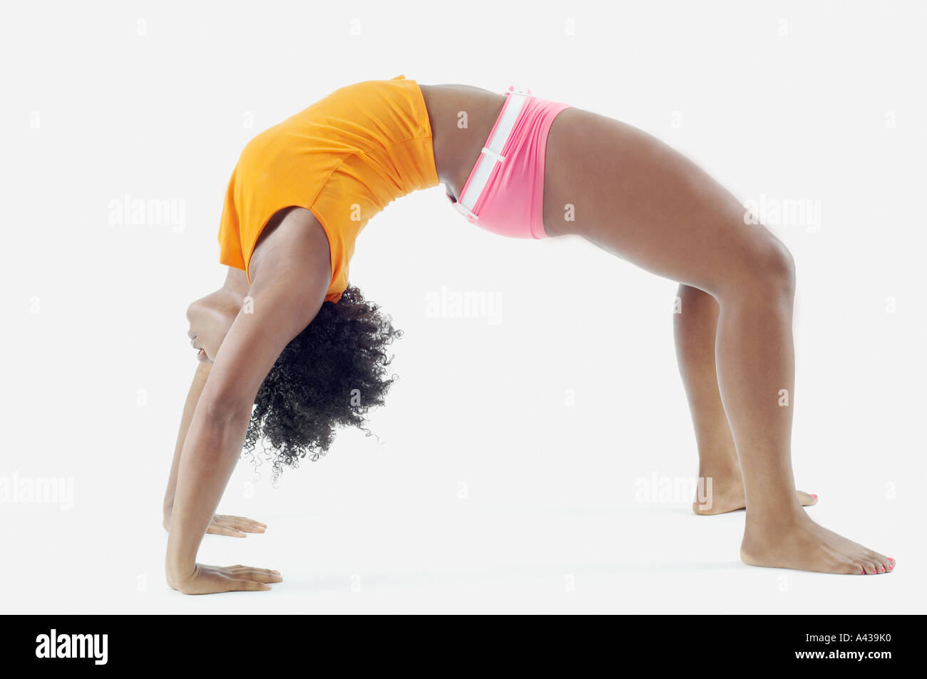 Woman in crab walk position Stock Photo Alamy