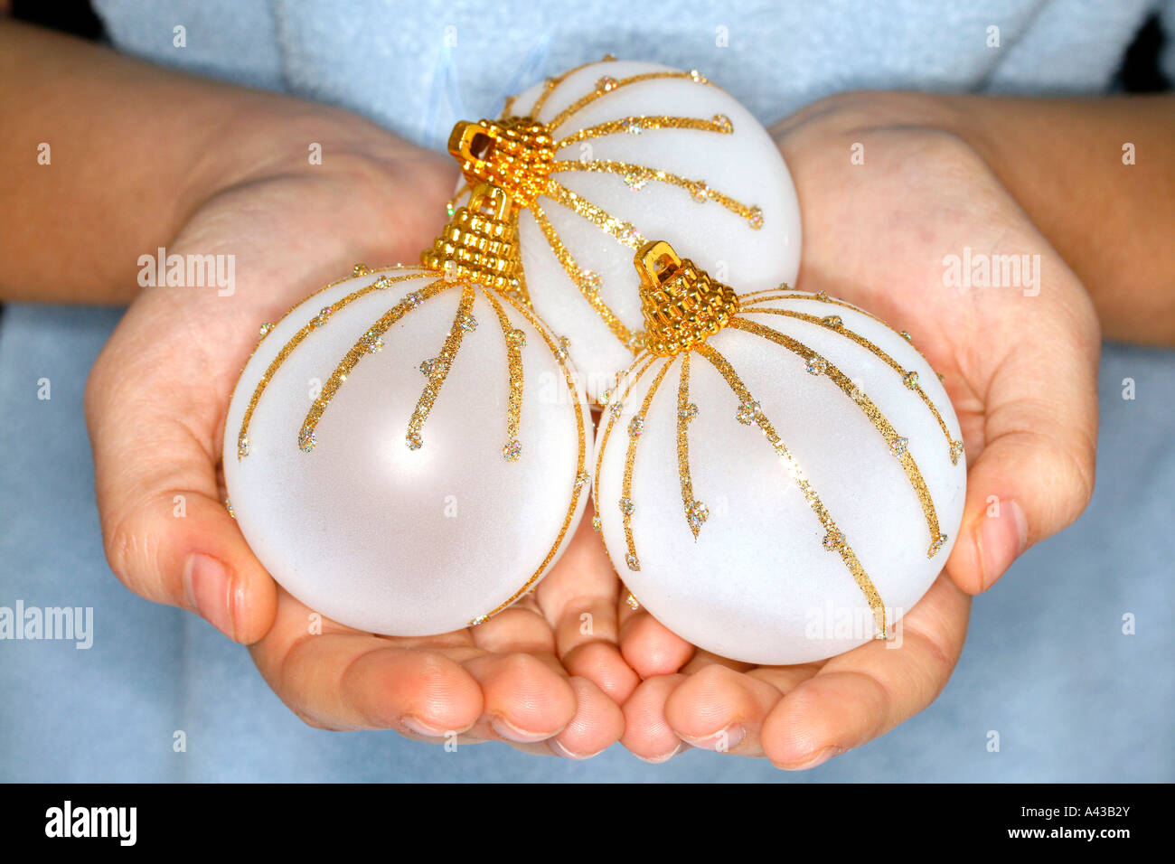 Woman holding up crystal ball hi-res stock photography and images - Alamy