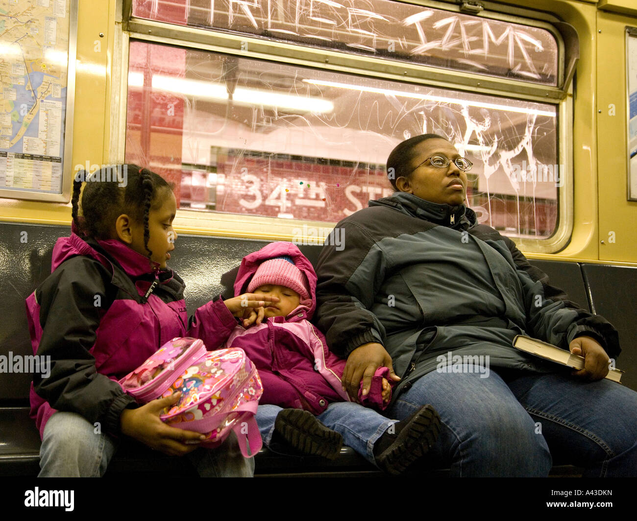 African American mother child and toddler on new york subway Stock Photo