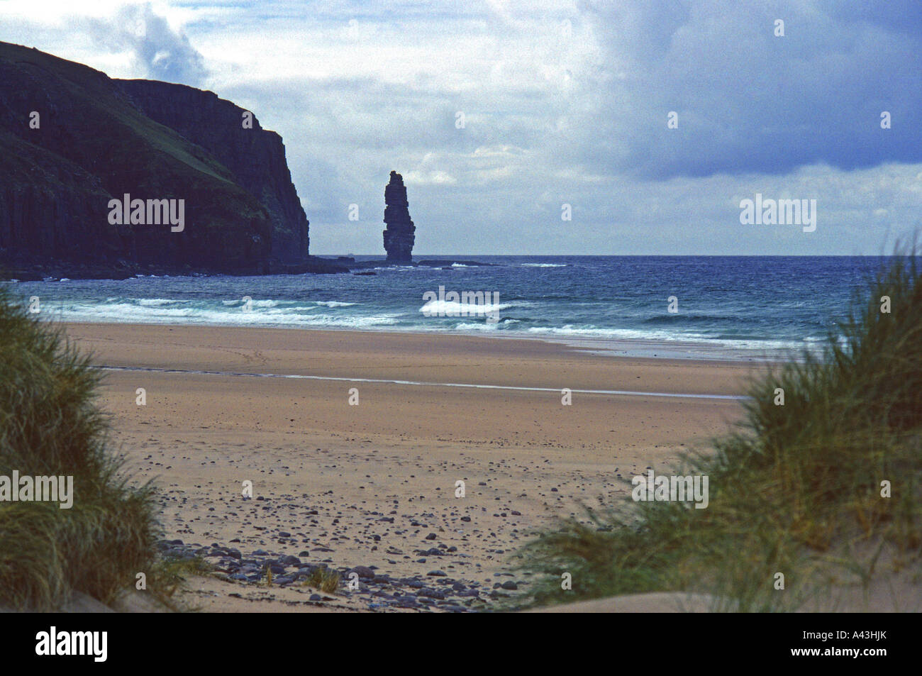 Am Buachaille sea stack from Sandwood Bay. Sutherland, Scotland, U.K., Europe. Stock Photo