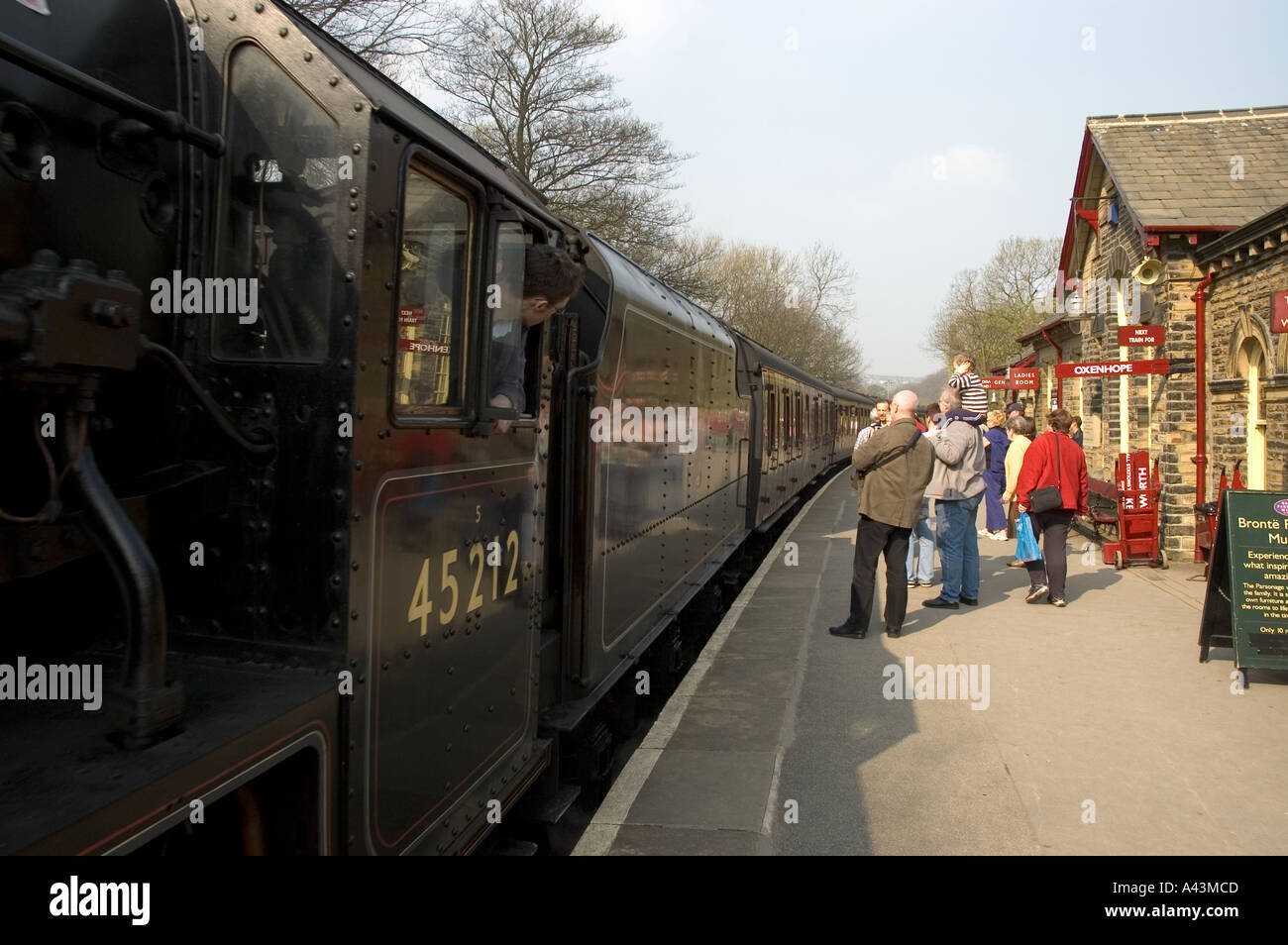 Steam train pulling into Haworth Station on the Keighley and Worth Valley Railway Stock Photo