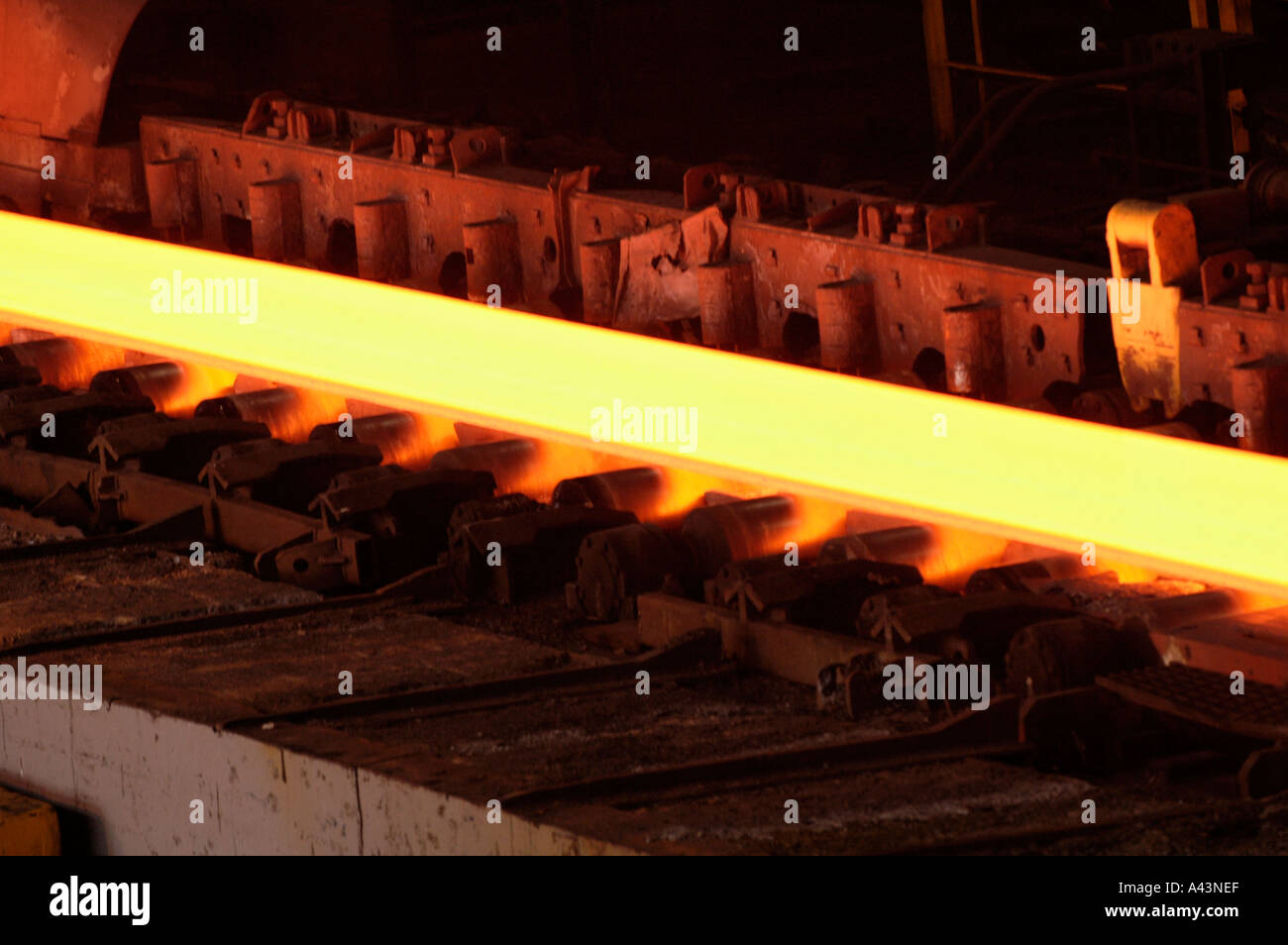 Steel slab being rolled on the Hot strip mill at Corus Llanwern steelworks Newport South Wales UK Stock Photo