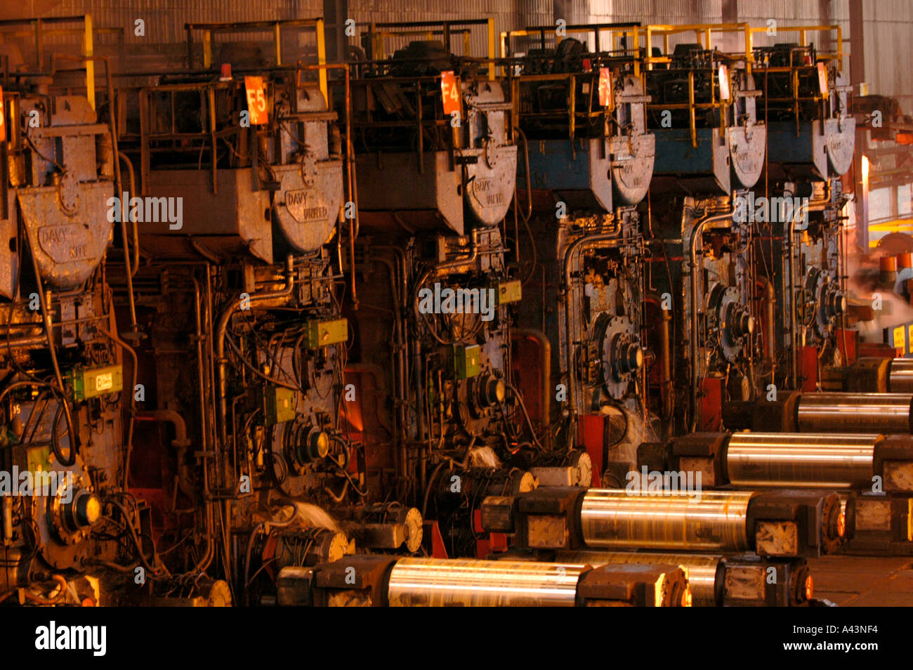 Steel slab being rolled on the Hot strip mill at Corus Llanwern steelworks Newport South Wales UK Stock Photo