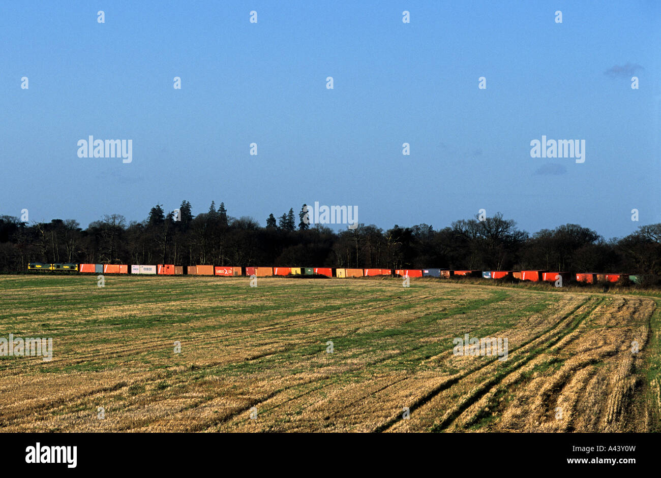 Freight train on the ipswich to the port of Felixstowe branch line, Levington, Suffolk, UK. Stock Photo