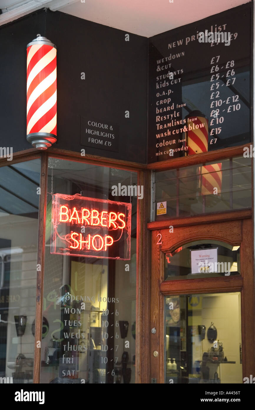 A Red Neon Glow Barbers Shop Neon Lettering Hair Cuts Hairdresser